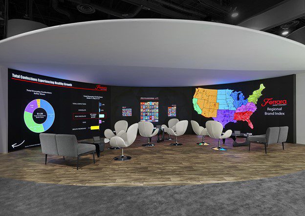 A trade show display with large screens
