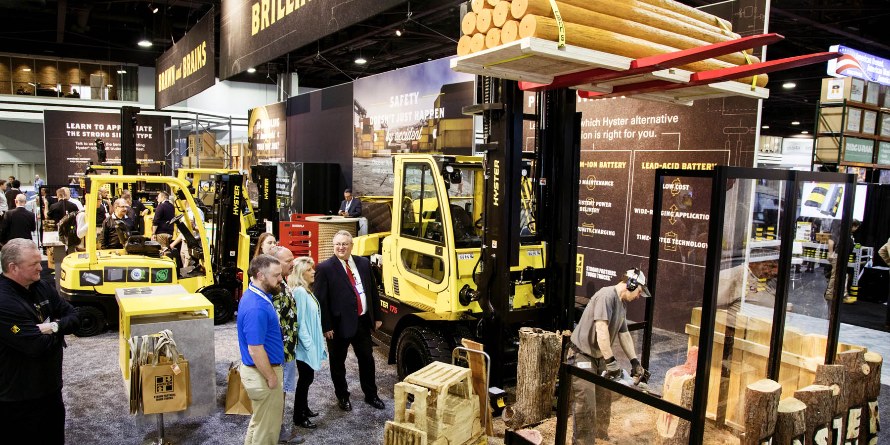 Panoramic view of Hyster exhibit with fork lifts