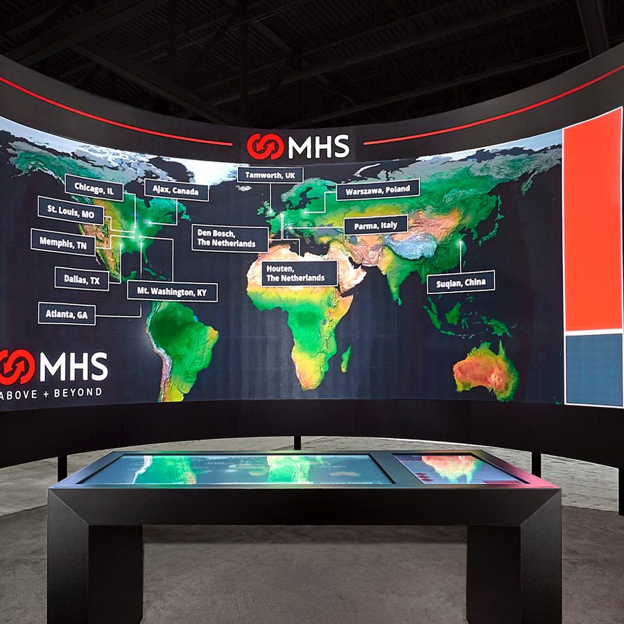 img-2 MHS trade show booth with a large world map