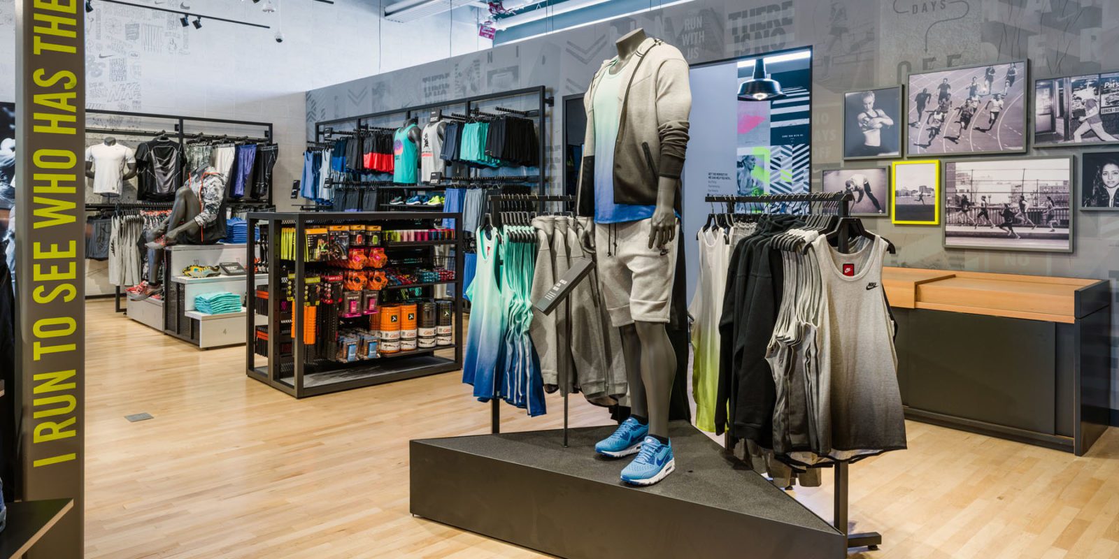 Nike store branded environment featuring a clothing display