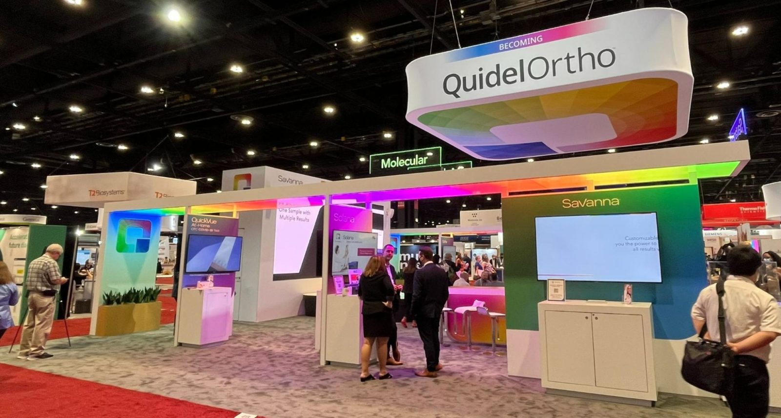 QuidelOrtho's colorful booth at AACC 2022