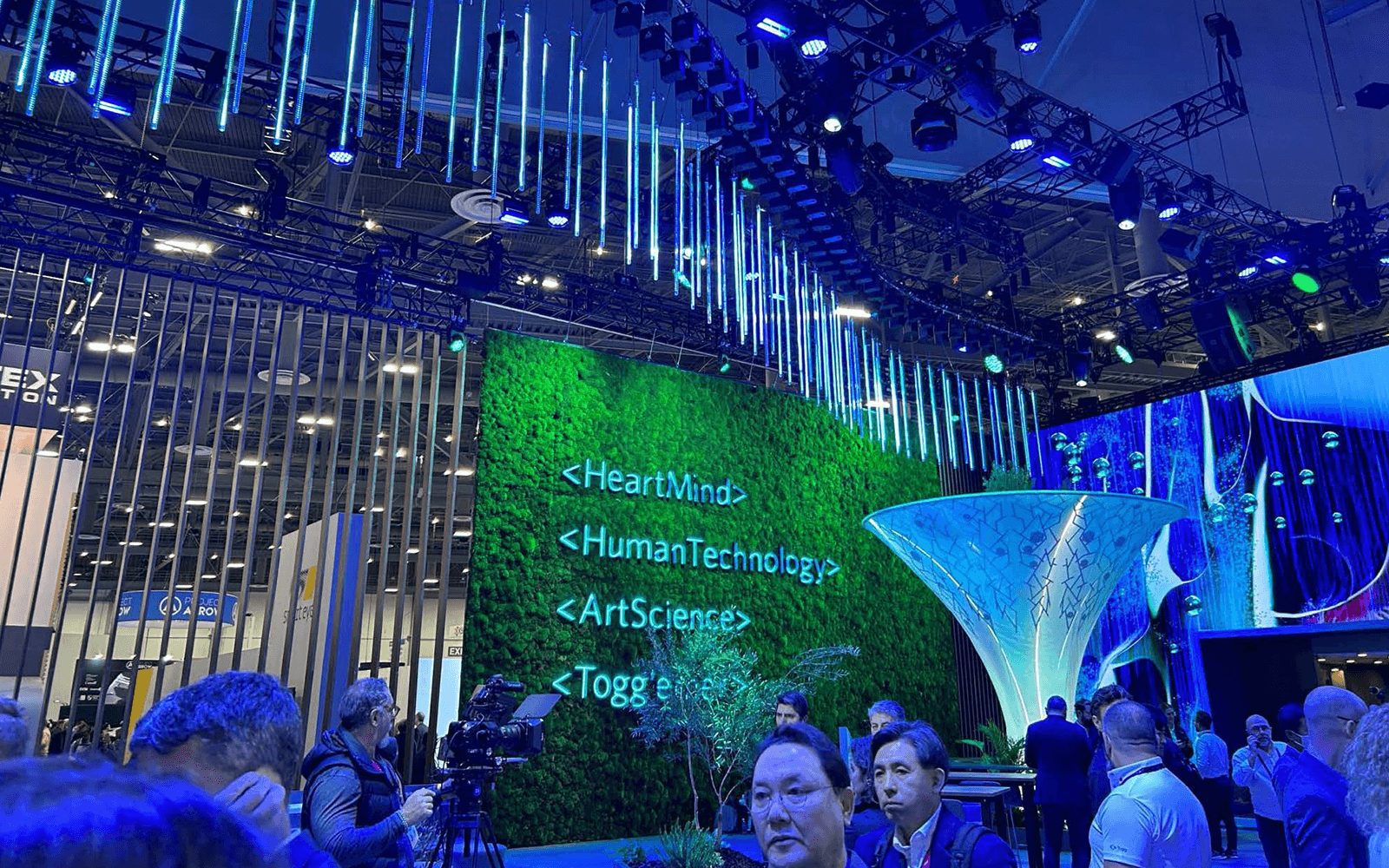 A greenery wall in the entrance to the Togg booth.